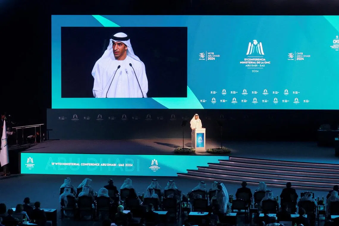 FILE PHOTO: UAE Minister of Foreign Trade Thani bin Ahmed Al Zeyoudi speaks during the opening ceremony of the WTO ministerial meeting in Abu Dhabi, United Arab Emirates, February 26, 2024. REUTERS/Abdel Hadi Ramahi/File Photo