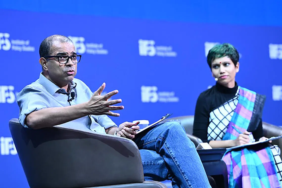 Dr Janil Puthucheary (left), speaking together with Dr Kalpana Vignehsa, at the Singapore Perspectives 2024 conference on Jan 29, 2024.