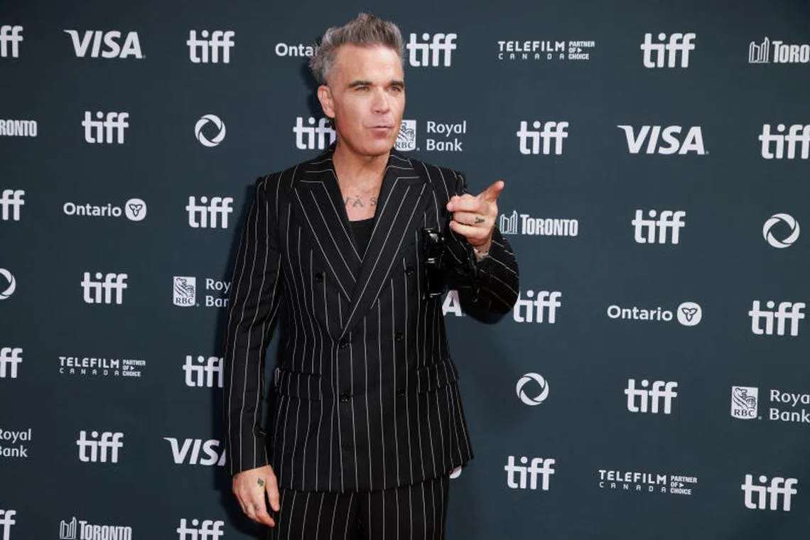 Robbie Williams poses on the red carpet before Better Man is screened at the Toronto International Film Festival in Toronto, Canada on Sept 9, 2024. 