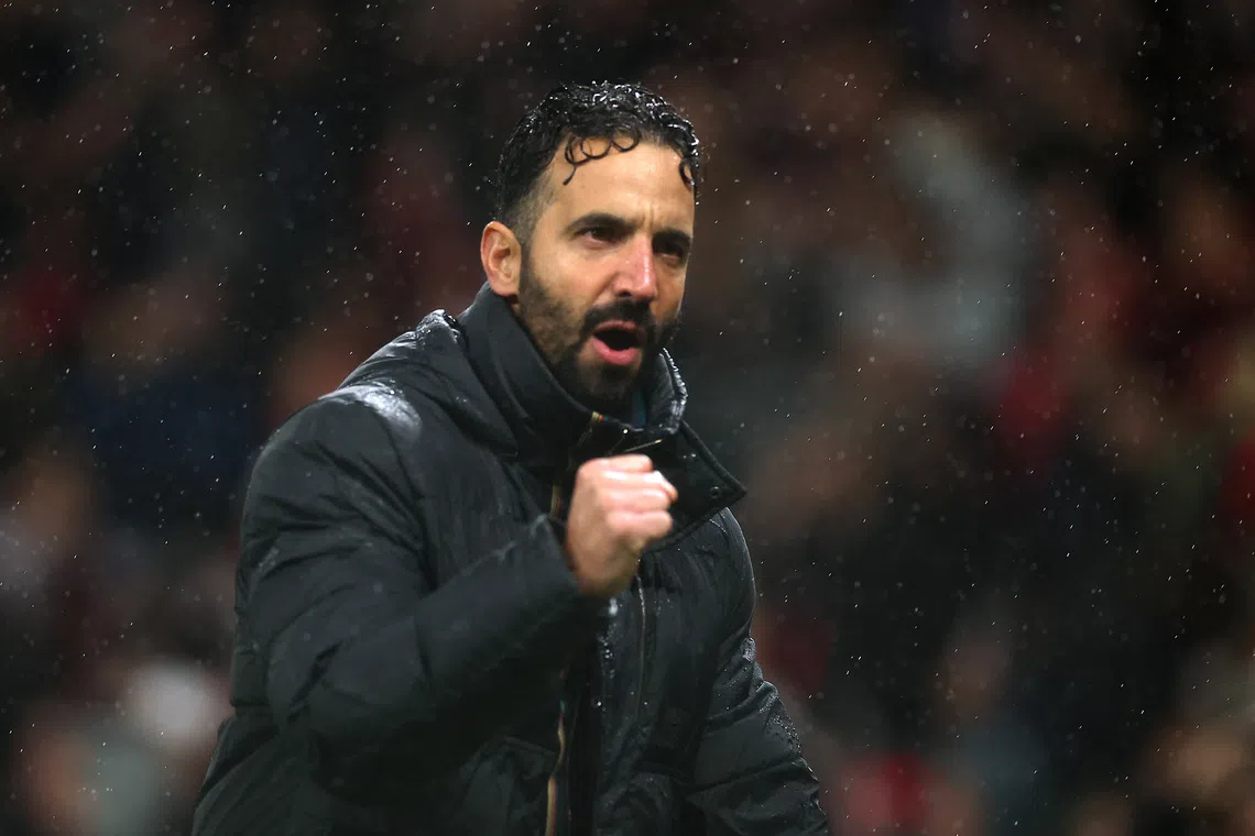 Soccer Football - Premier League - Manchester United v Chelsea - Old Trafford, Manchester, Britain - September 20, 2025 Manchester United manager Ruben Amorim celebrates after the match REUTERS/Phil Noble EDITORIAL USE ONLY. NO USE WITH UNAUTHORIZED AUDIO, VIDEO, DATA, FIXTURE LISTS, CLUB/LEAGUE LOGOS OR 'LIVE' SERVICES. ONLINE IN-MATCH USE LIMITED TO 120 IMAGES, NO VIDEO EMULATION. NO USE IN BETTING, GAMES OR SINGLE CLUB/LEAGUE/PLAYER PUBLICATIONS. PLEASE CONTACT YOUR ACCOUNT REPRESENTATIVE FOR FURTHER DETAILS..