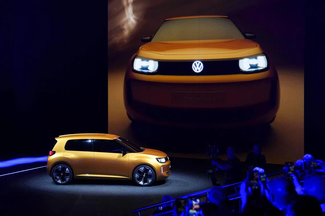 German car manufacturer Volkswagen (VW) presents the new electric vehicle "ID. EVERY1" in Duesseldorf, western Germany on March 5, 2025. (Photo by PAU BARRENA / AFP)