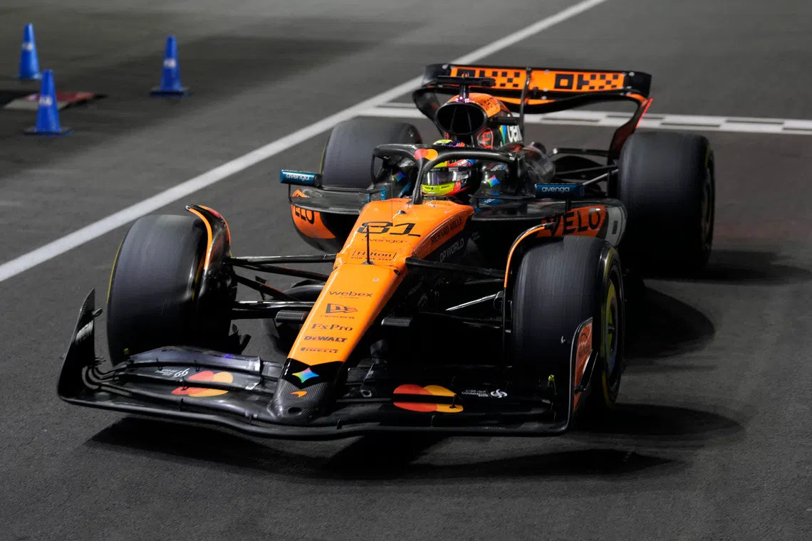 Formula One F1 - Qatar Grand Prix - Lusail International Circuit, Lusail, Qatar - November 30, 2025 McLaren's Oscar Piastri in the pit lane during the race Pool via REUTERS/Altaf Qadri