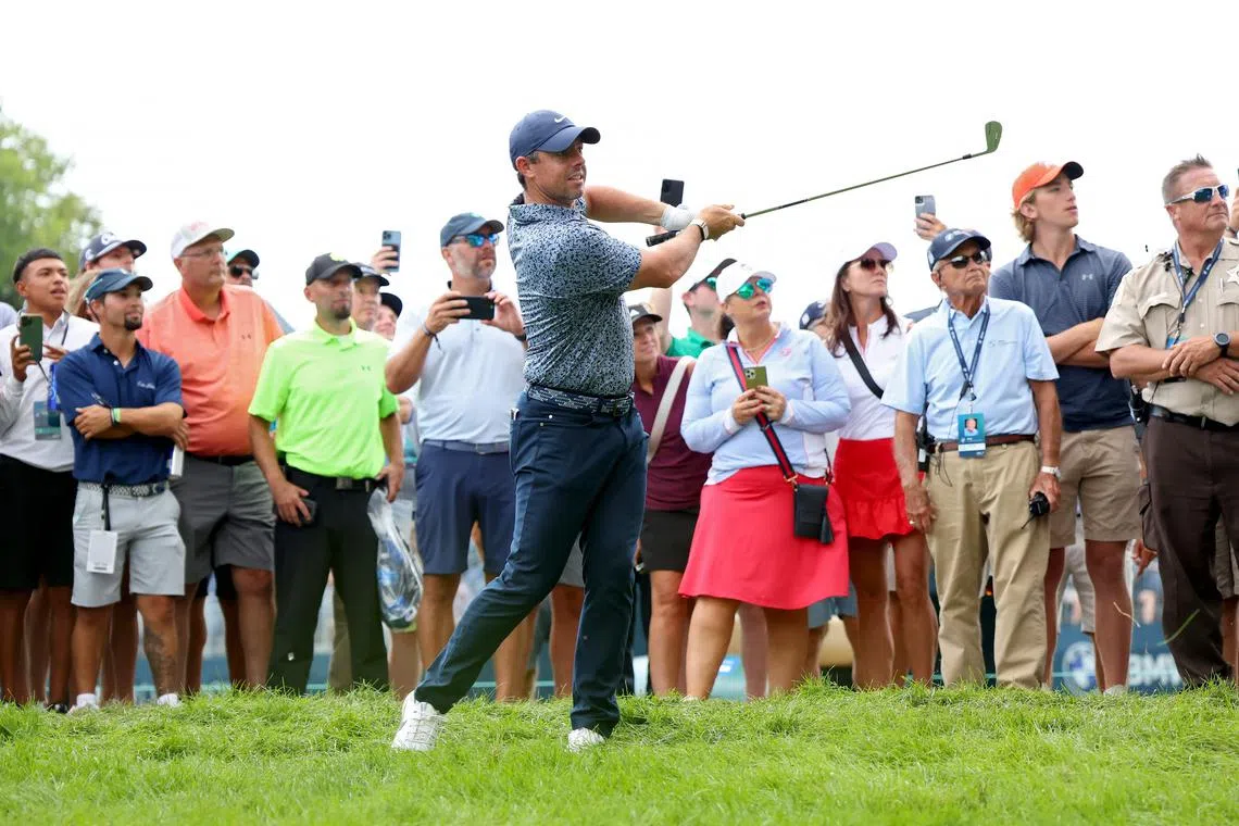 OLYMPIA FIELDS, ILLINOIS - AUGUST 17: Rory McIlroy of Northern Ireland plays a shot on the 17th hole during the first round of the BMW Championship at Olympia Fields Country Club on August 17, 2023 in Olympia Fields, Illinois.   Michael Reaves/Getty Images/AFP (Photo by Michael Reaves / GETTY IMAGES NORTH AMERICA / Getty Images via AFP)