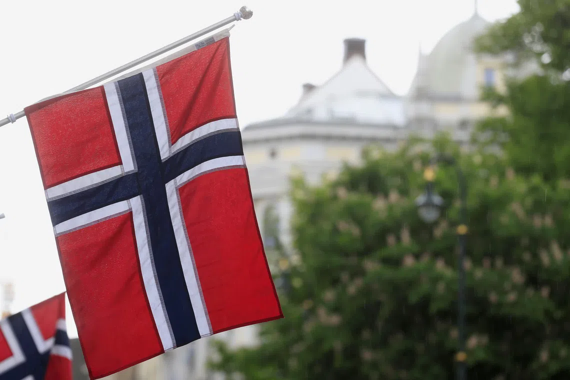 Norwegian flags flutter at Karl Johans street in Oslo, Norway May 31, 2017. REUTERS/Ints Kalnins