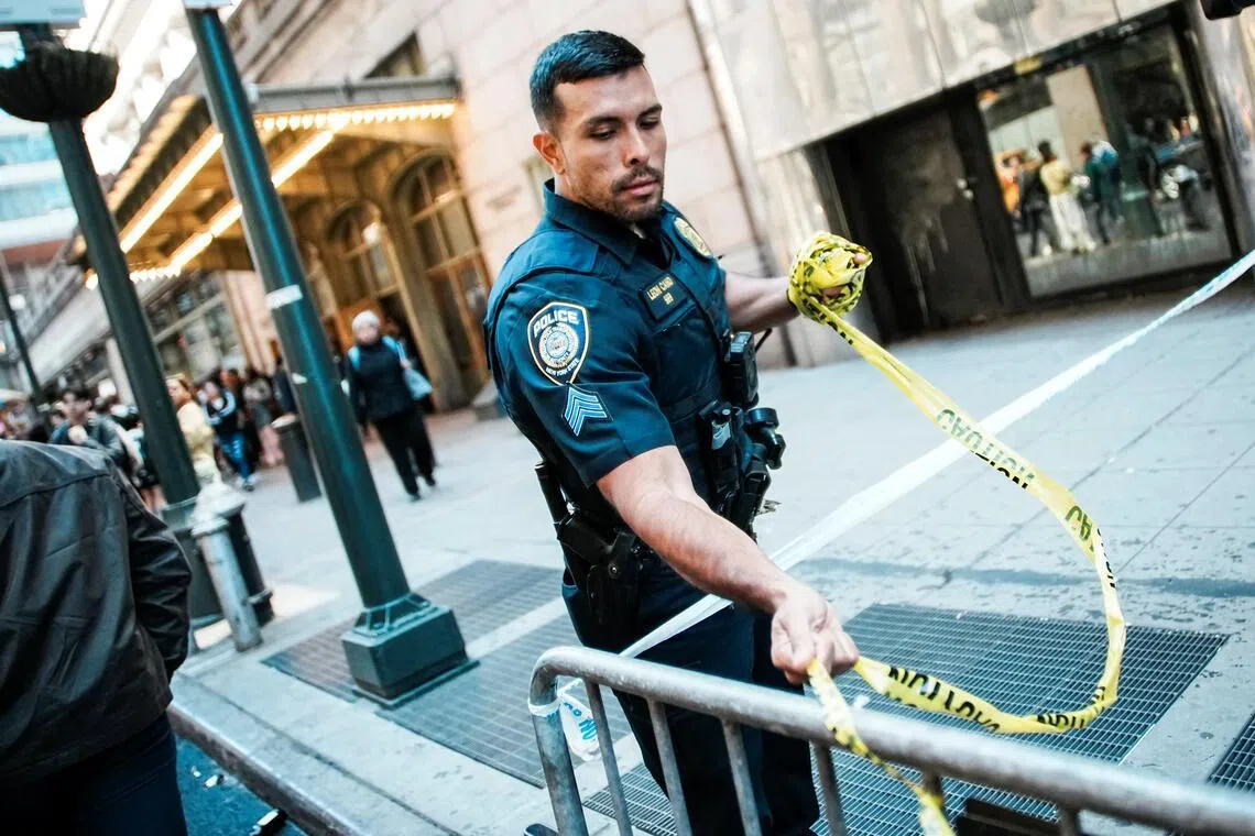 Man stabs 3 with machete at New York’s Grand Central and is fatally shot by officer