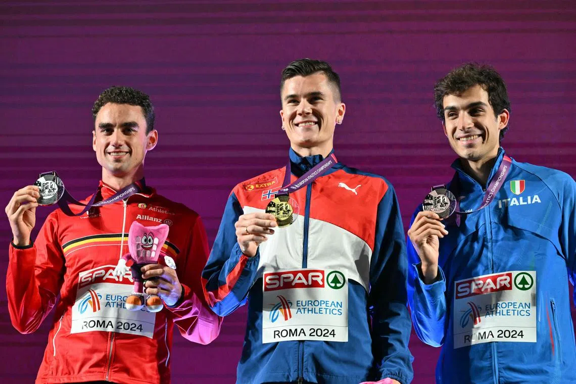 From left: Belgium's Jochem Vermeulen, Norway's Jakob Ingebrigtsen and Italy's Pietro Arese pose with their medals after the 1,500m race at the European Championships in Rome.