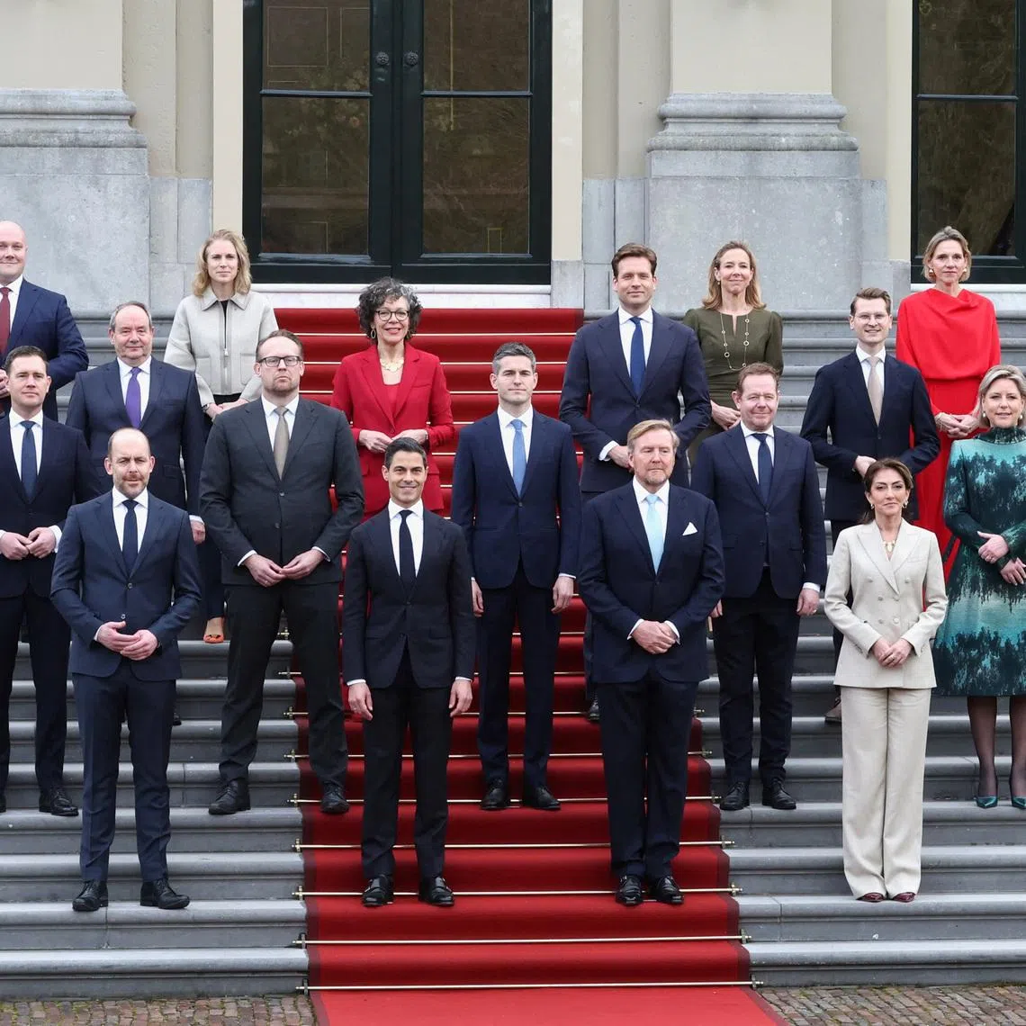 King Willem-Alexander of the Netherlands poses with new Dutch Prime Minister Rob Jetten and the new members of the Dutch Government at the Palace Huis ten Bosch, in The Hague, Netherlands, February 23, 2026. REUTERS/Peter Lous