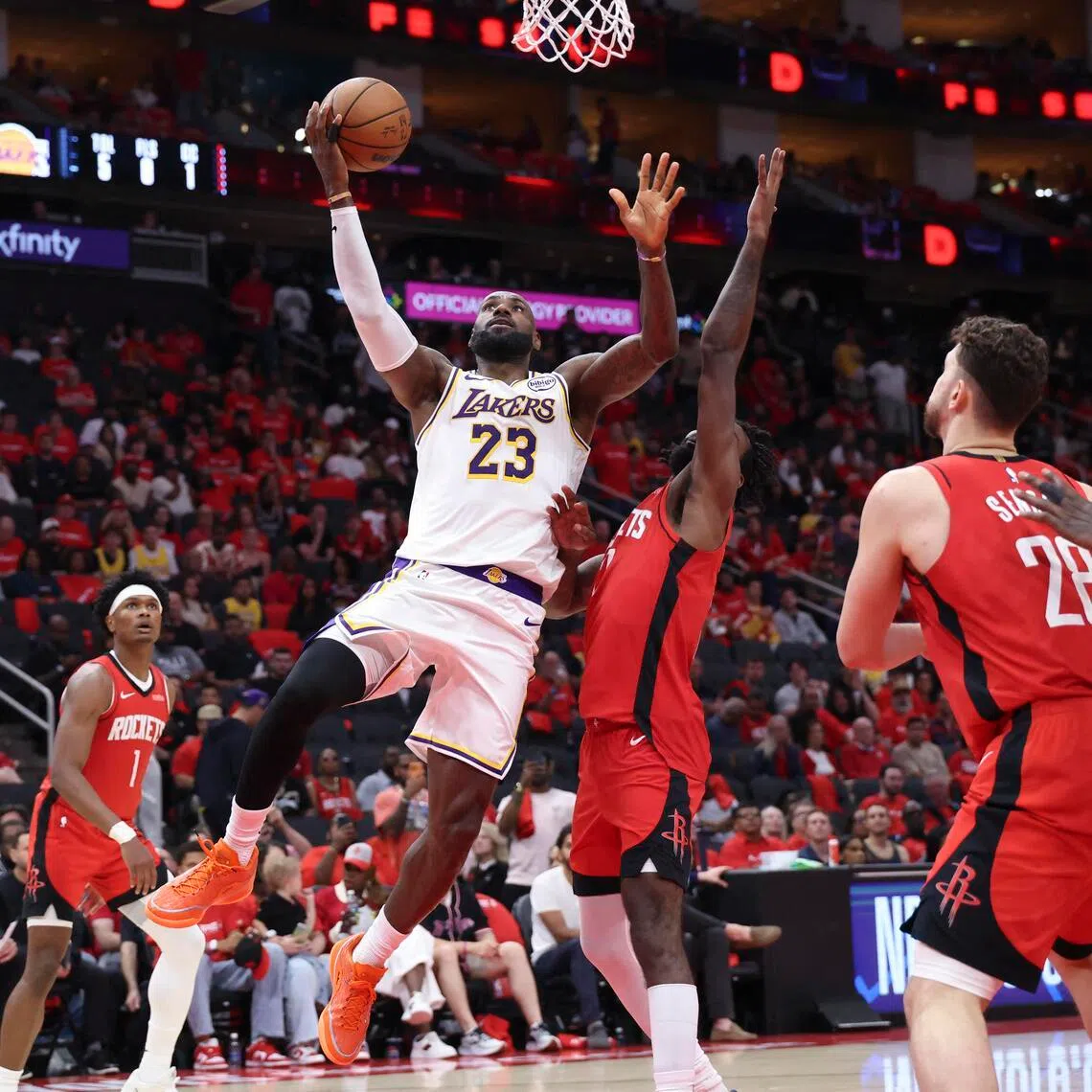 Los Angeles Lakers forward LeBron James shoots the ball as Houston Rockets forward Tari Eason defends during the third quarter of Game 4.