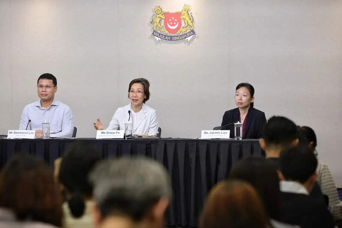 (From left) Education Minister Desmond Lee, Minister for Sustainability and the Environment Grace Fu and Acting Minister for Manpower Jasmin Lau speaking at a press conference at the National Press Centre on Oct 16.