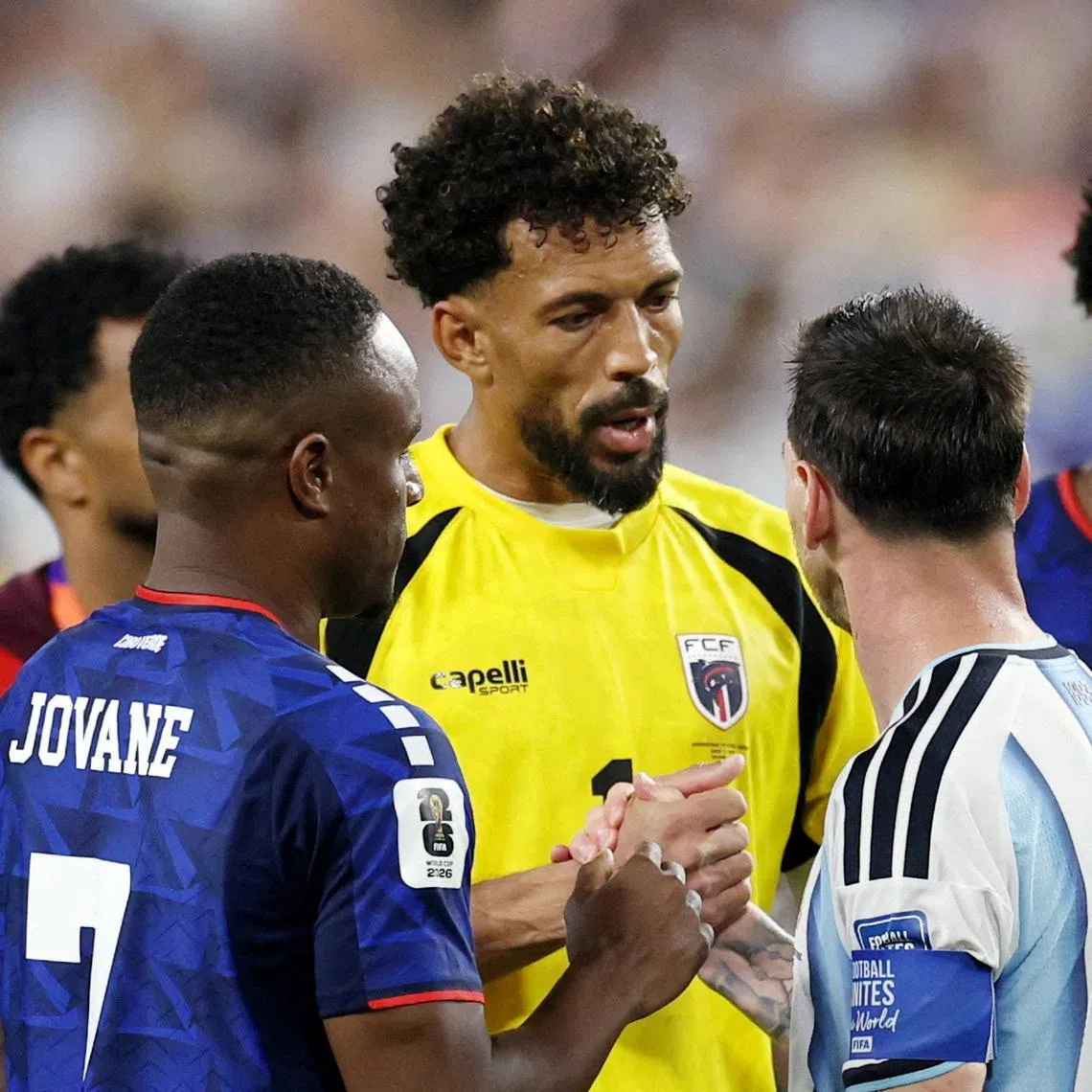Cape Verde’s Jovane Cabral and 40-year-old goalkeeper Vozinha speaking with Argentina’s Lionel Messi after their World Cup campaign came to an end.