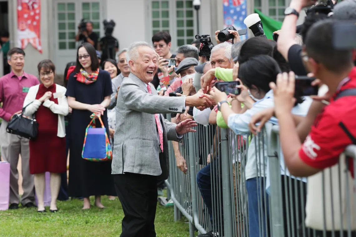 Ng Kok Song greeting his supporters at the nomination centre. 
