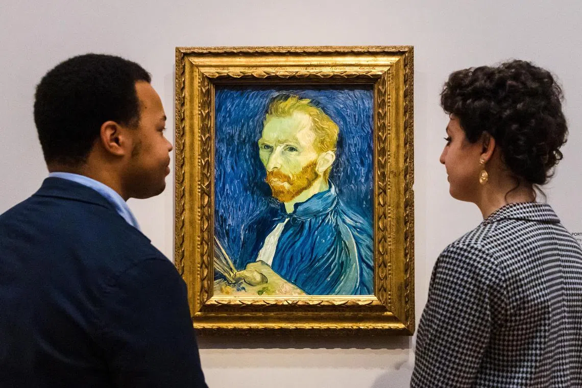 People viewing 'Self-Portrait, Saint-Remy, first week of September 1889' by Dutch artist Vincent Van Gough at the Courtauld Gallery in London, February 2022.