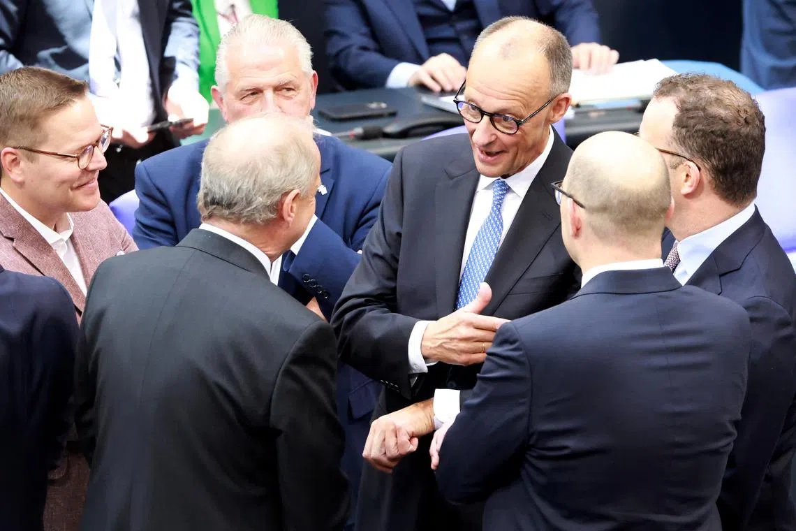 Designated German Chancellor Friedrich Merz (centre) at the Bundestag in Berlin on May 6.