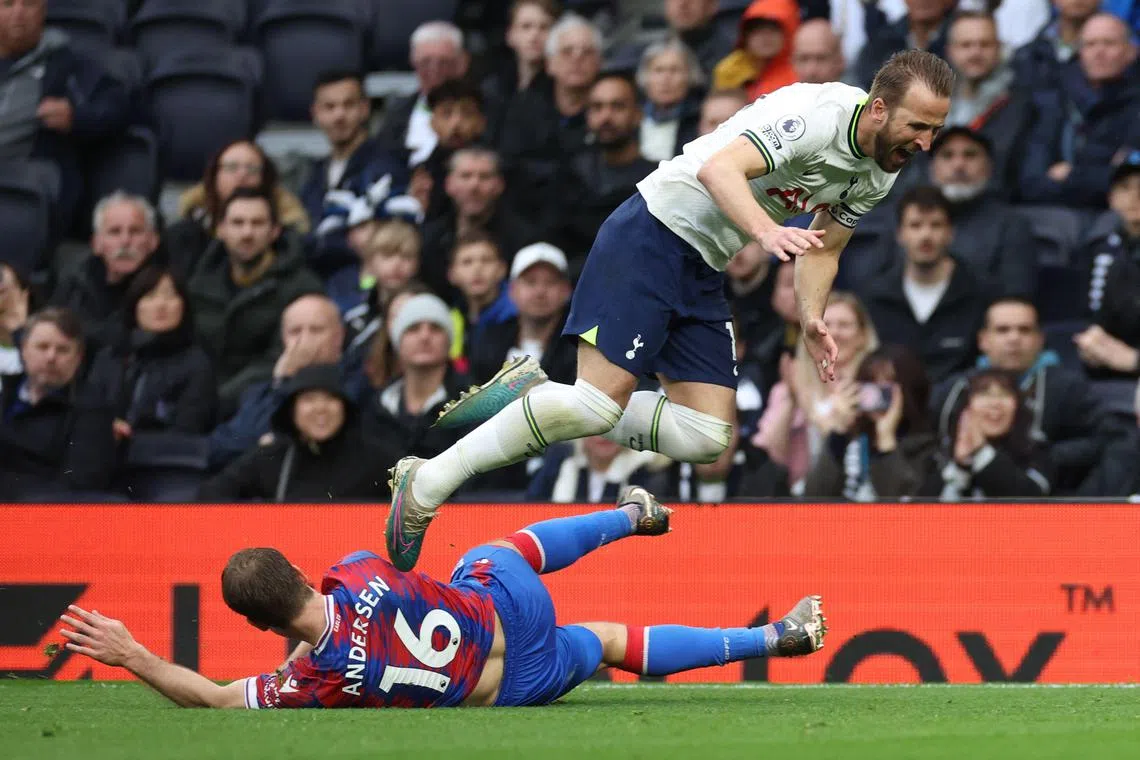 Tottenham striker Harry Kane being tackled by Crystal Palace defender Joachim Andersen in their English Premier League football match on May 6, 2023.