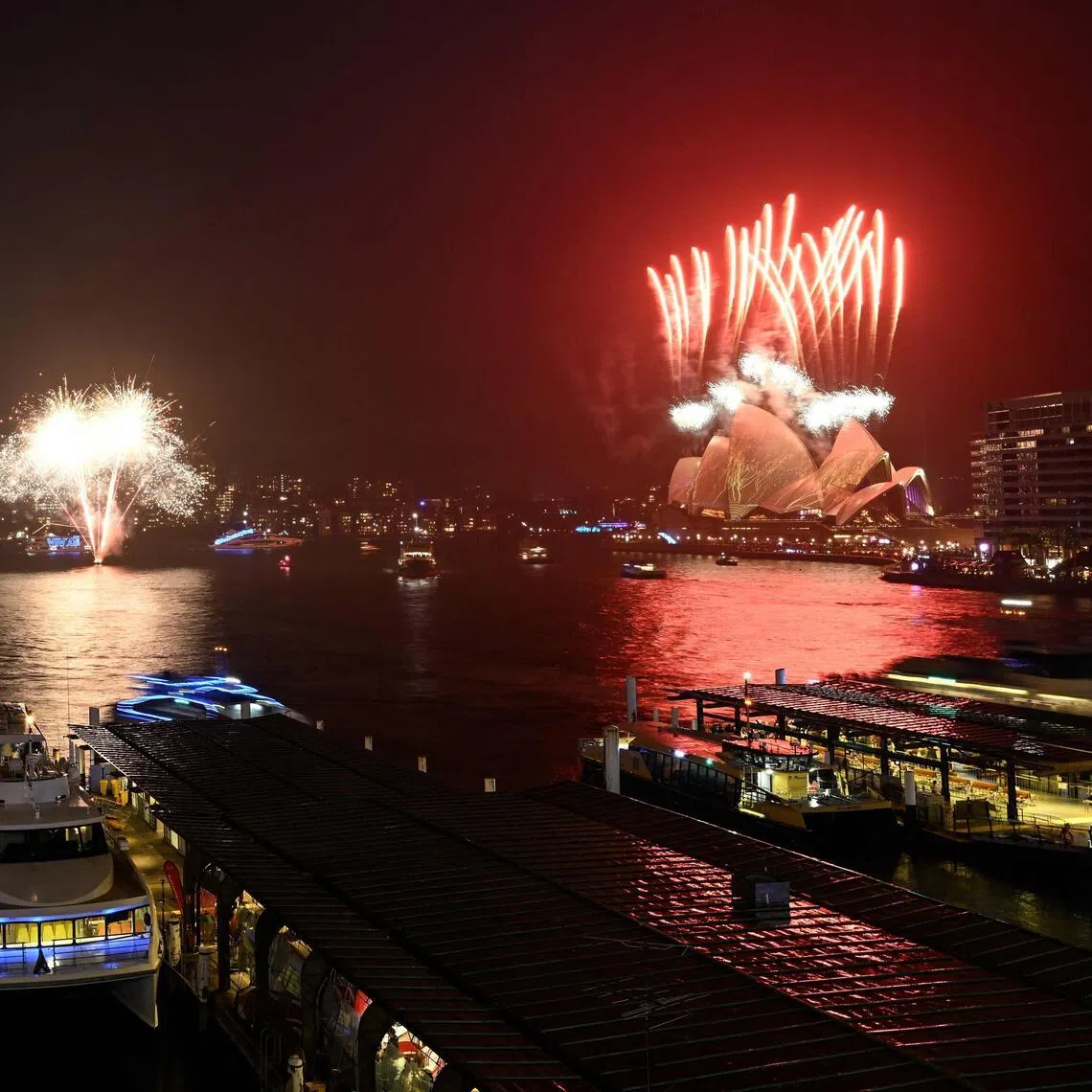 Fireworks explode over the harbour illuminating the Opera House and Harbour Bridge on the opening night of the annual Vivid Sydney festival in Sydney on May 22.