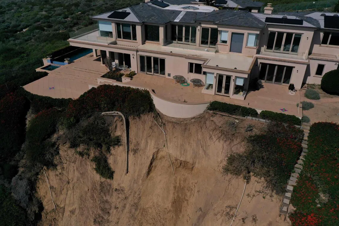 Multi-million-dollar homes crouched on a California clifftop got a little bit closer to the edge when a landslide brought tons of rock and soil crashing into the sea.