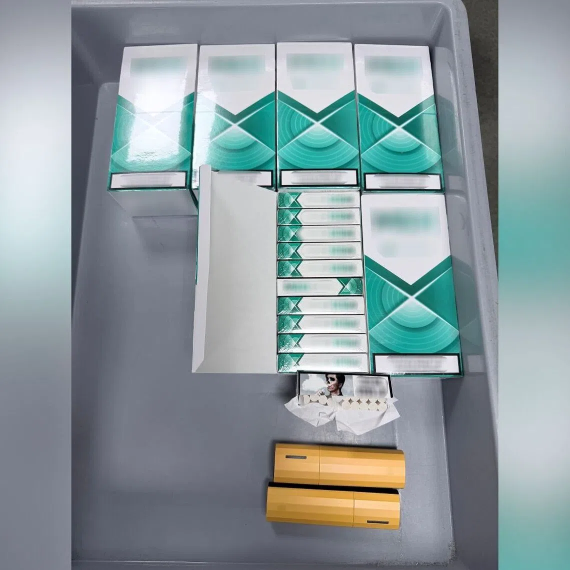 ICA officers found 2 vapes, more than 50 vape pods and more than 1,200 heat sticks in the woman's possession.