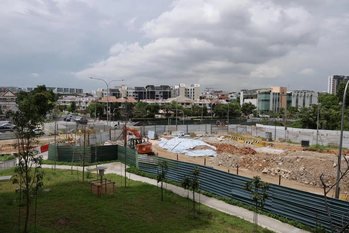 Resumption of work on the stalled Bidadari Park Drive road, the new housing estate's main transport spine which is to join Bartley Road, on April 17, 2024. The project came to a standstill a year ago when it emerged that there was a 1m height difference between the two roads.