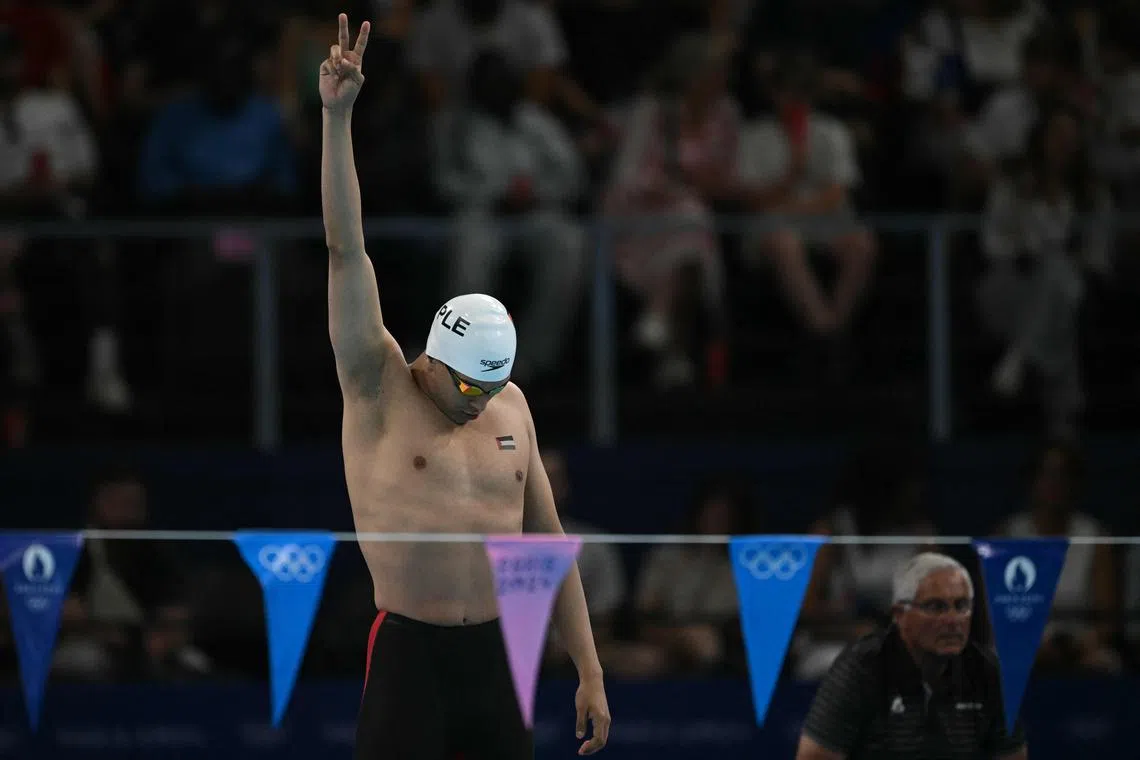 Palestine's Yazan Al Bawwab reacts before a heat of the men's 100m backstroke swimming event during the Paris 2024 Olympic Games at the Paris La Defense Arena in Nanterre, west of Paris, on July 28, 2024. (Photo by Oli SCARFF / AFP)