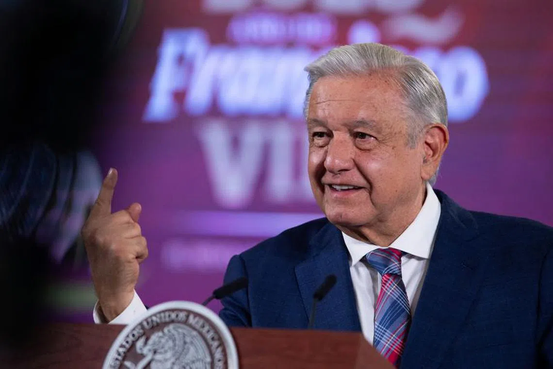 Mexican President Andres Manuel Lopez Obrador gestures during a press conference, where he rejected U.S. plans to build new sections of wall at the U.S.-Mexico border, ahead of high-level meetings with U.S. officials expected to focus on immigration and security, at the National Palace in Mexico City, Mexico October 5, 2023. Mexico Presidency/Handout via REUTERS/File Photo