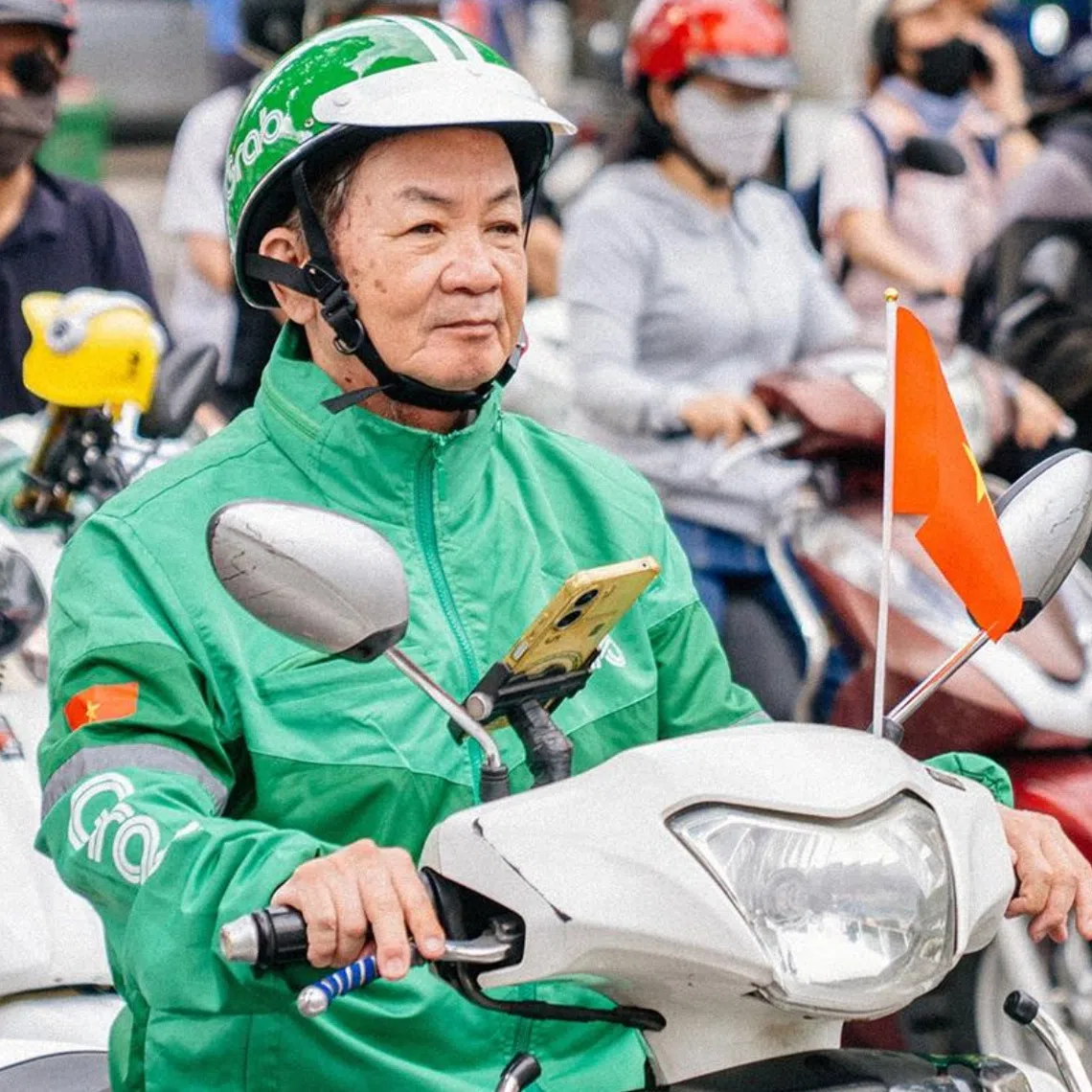 About 400,000 ride-hailing and delivery motorbike riders in Ho Chi Minh City have to choose between switching to e-bikes and quitting their jobs amid policy shifts.