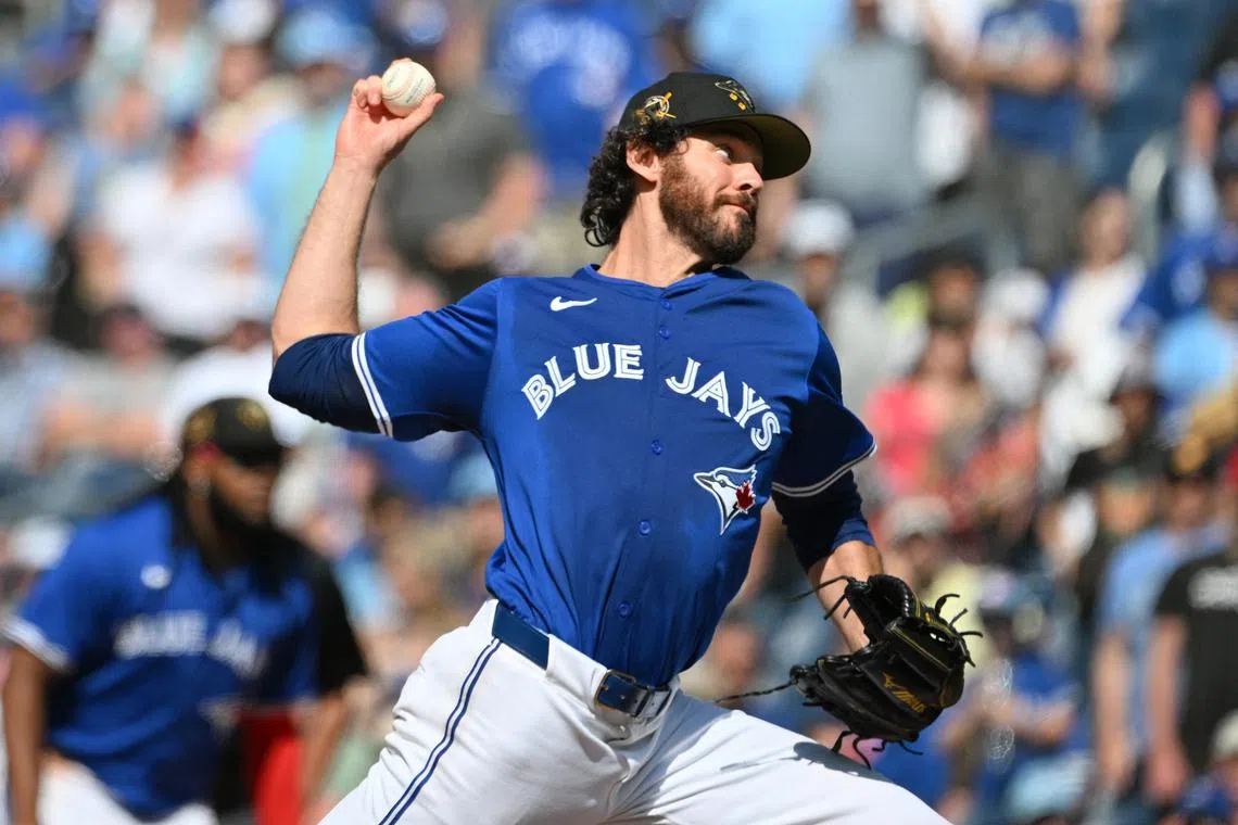 FILE PHOTO: May 19, 2024; Toronto, Ontario, CAN;  Toronto Blue Jays relief pitcher Jordan Romano (68) delivers a pitch against the Tampa Bay Rays in the ninth inning at Rogers Centre. Mandatory Credit: Dan Hamilton-USA TODAY Sports/File Photo