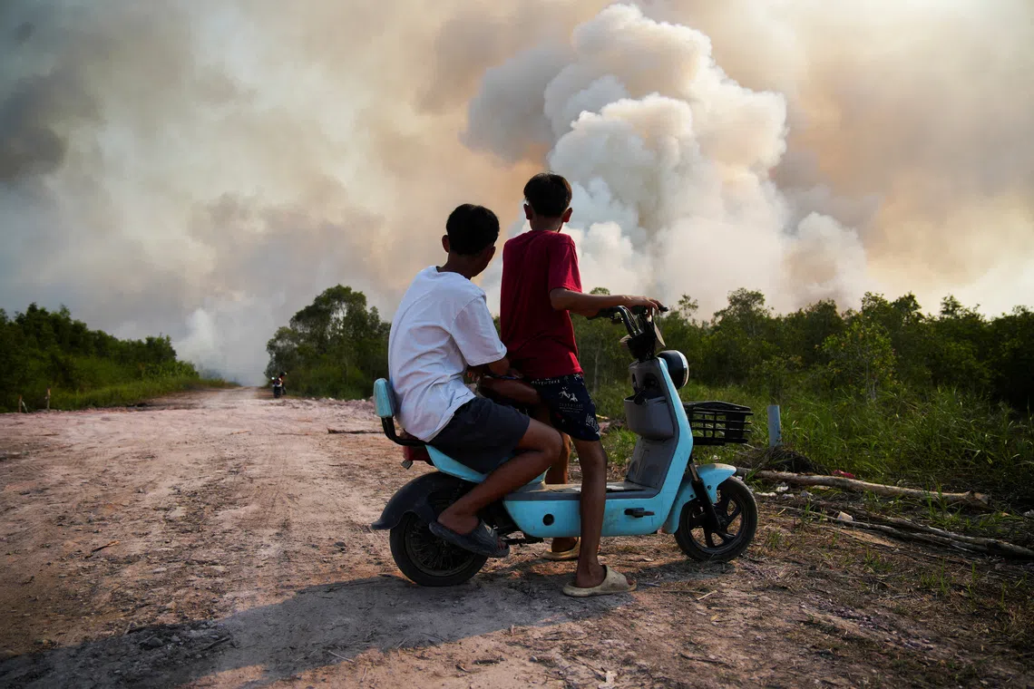 A wildfire in Ogan Ilir regency, in Indonesia’s South Sumatra province, on Aug 9.