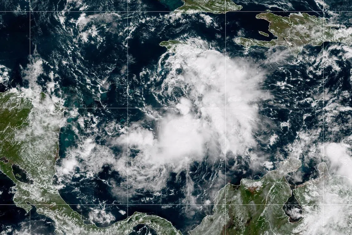 Tropical Storm Lisa (above) is expected to reach hurricane status on Wednesday.