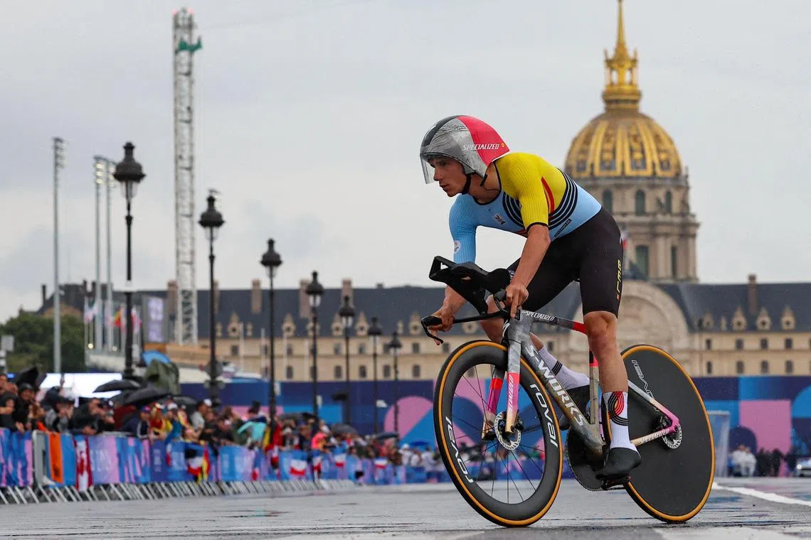 Belgium's Remco Evenepoel cycles past Invalides in the 2024 Paris OIympics individual time trial. The double Games champion broke a hand, ribs and shoulder blade during a training run on Dec 3, 2024.