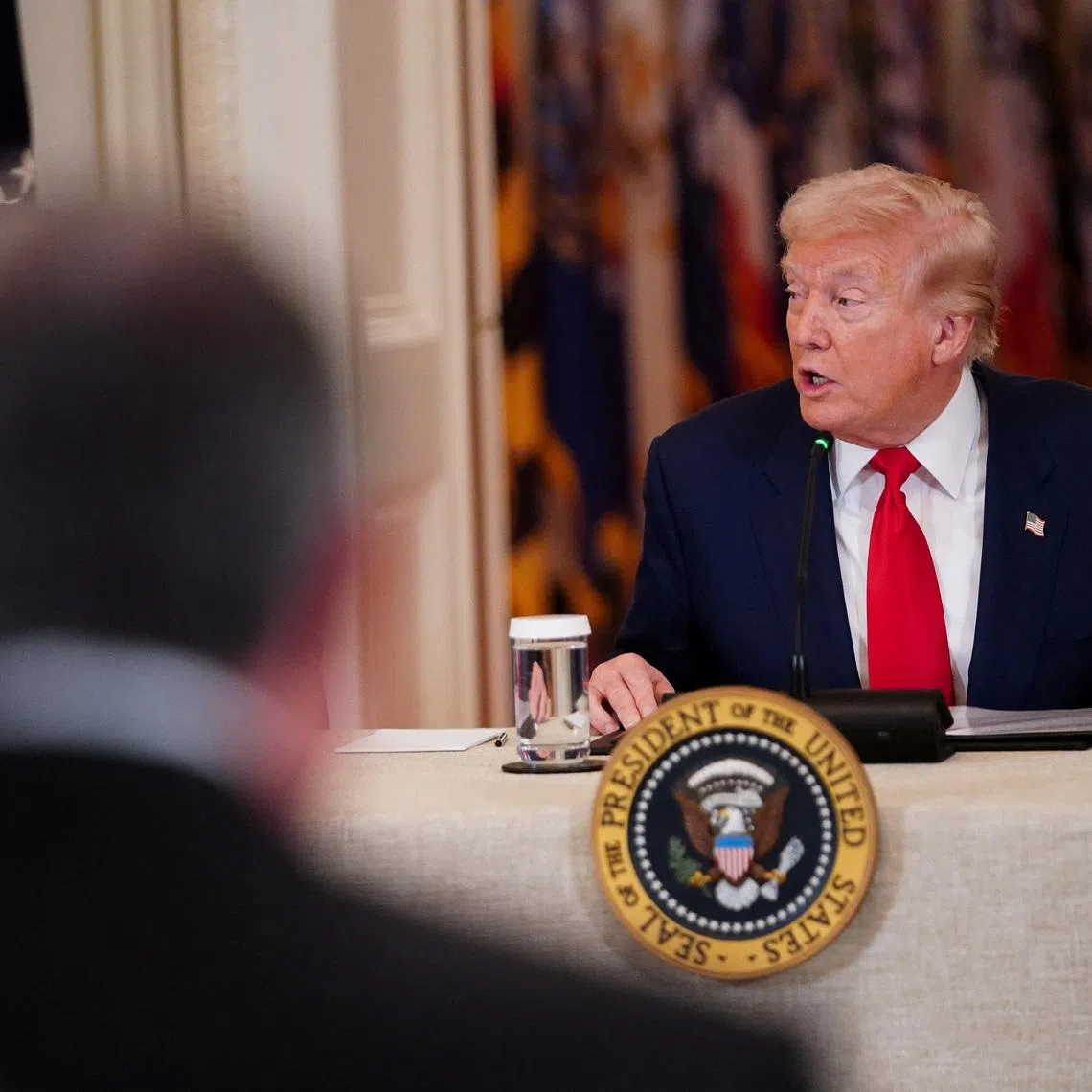 U.S. President Donald Trump speaks during a round table on collegiate sports in the White House in Washington, D.C., March 6, 2026. REUTERS/Nathan Howard