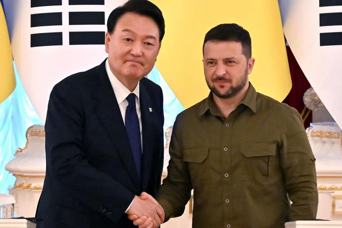 In July 2023, South Korean President Yoon Suk-yeol (left) met Ukrainian President Volodymyr Zelensky and offered aid despite domestic criticism.