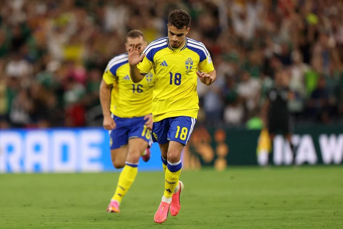 Sweden's midfielder Yasin Ayari celebrates very respectfully after scoring against Tunisia, which is the land his father came from. 