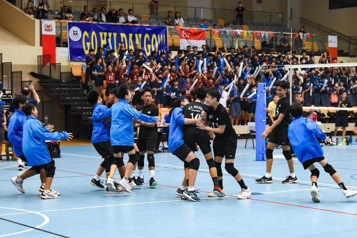 St Hilda's Secondary School's players celebrating their win after the C Division volleyball boys' final on Tuesday.

ST PHOTO: EUGENE TAN