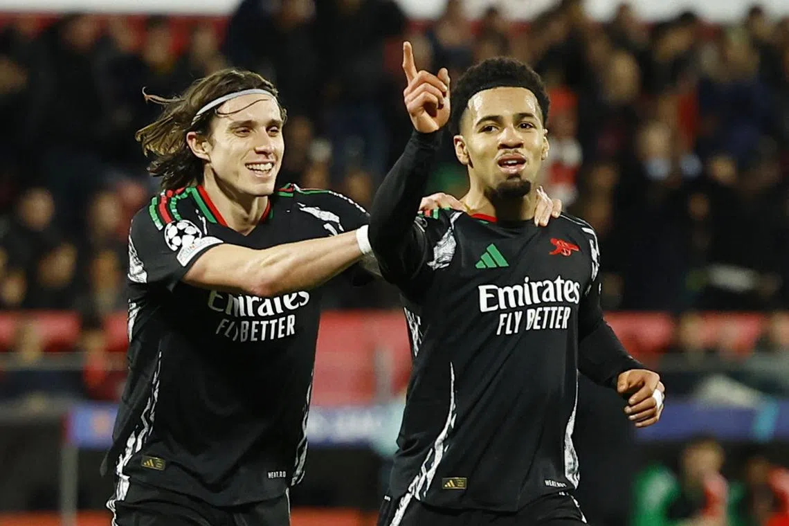 Soccer Football - Champions League - Girona v Arsenal - Estadi Montilivi, Girona, Spain - January 29, 2025 Arsenal's Ethan Nwaneri celebrates scoring their second goal with Riccardo Calafiori REUTERS/Albert Gea