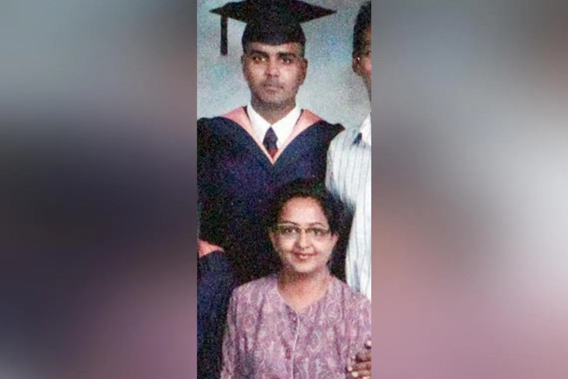 Sujay Solomon Sutherson (in graduation gown) and his mother, Madam Mallika Jesudasan, in a family photo in happier times.