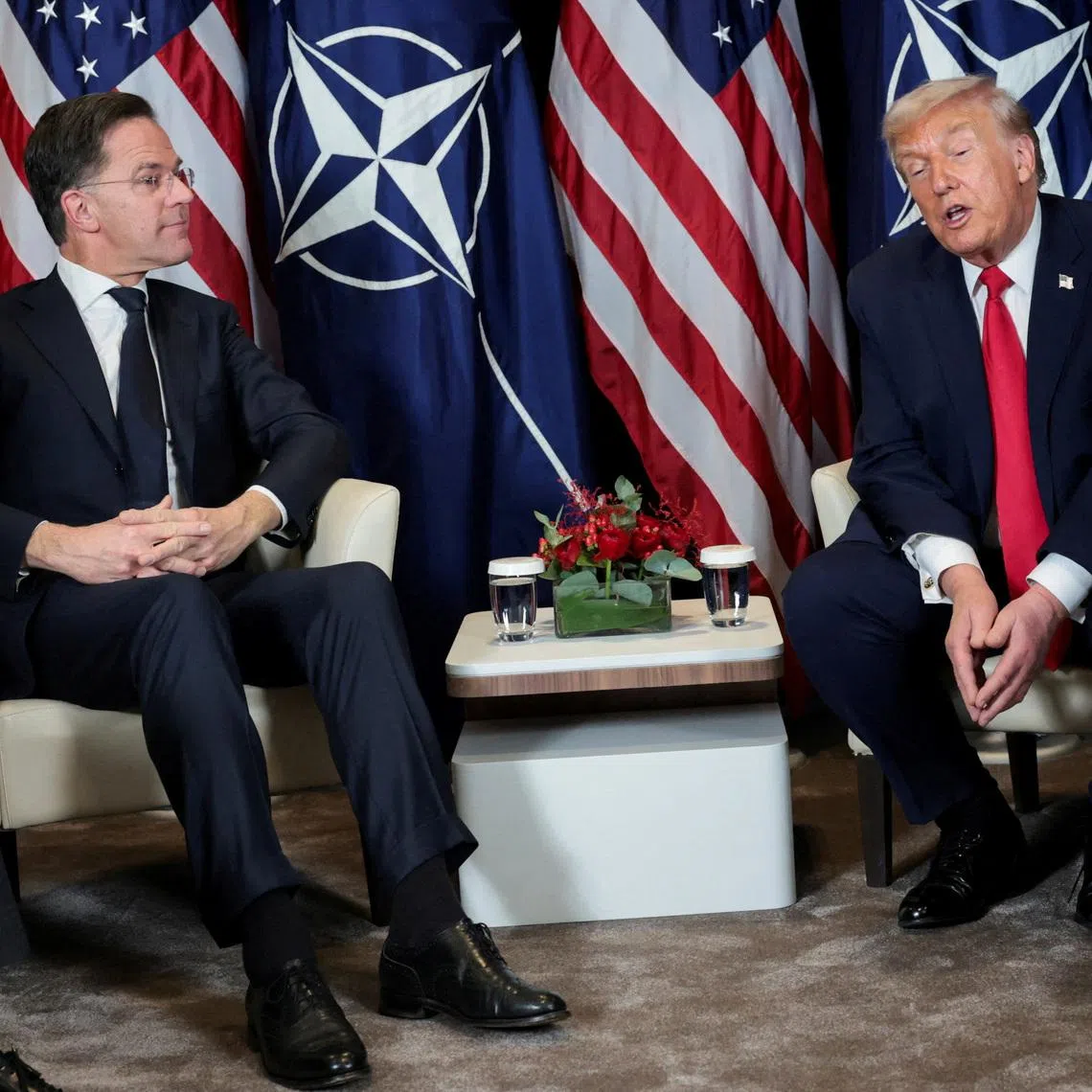 FILE PHOTO: U.S. President Donald Trump holds a bilateral meeting with NATO Secretary General Mark Rutte at the World Economic Forum (WEF) in Davos, Switzerland, January 21, 2026. REUTERS/Jonathan Ernst/File Photo