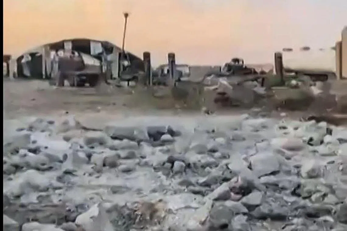 Damage following an alleged bombing on an Iraqi military base in the central province of Babylon housing a coalition of pro-Iranian armed groups on April 20, 2024.