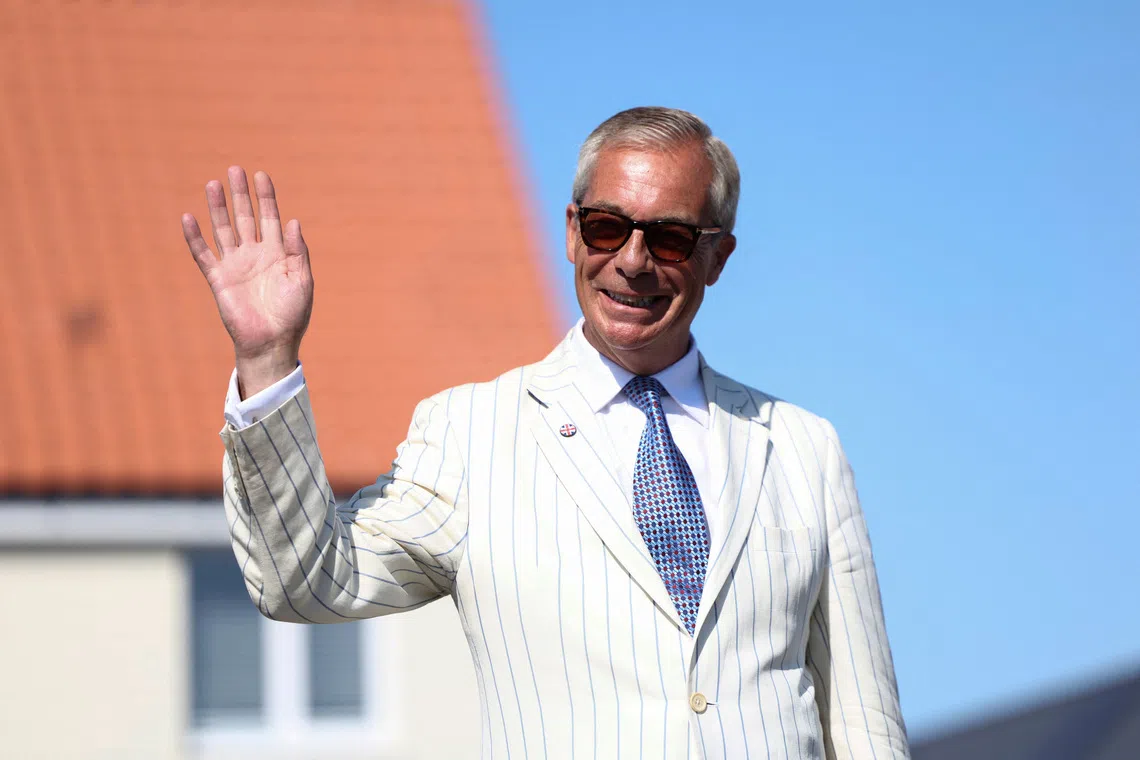 Britain's Reform UK party leader Nigel Farage arrives at his polling station for the Clacton by-election, triggered by his own resignation, in Walton-on-the-Naze, Essex, Britain, August 13, 2026. REUTERS/Toby Shepheard