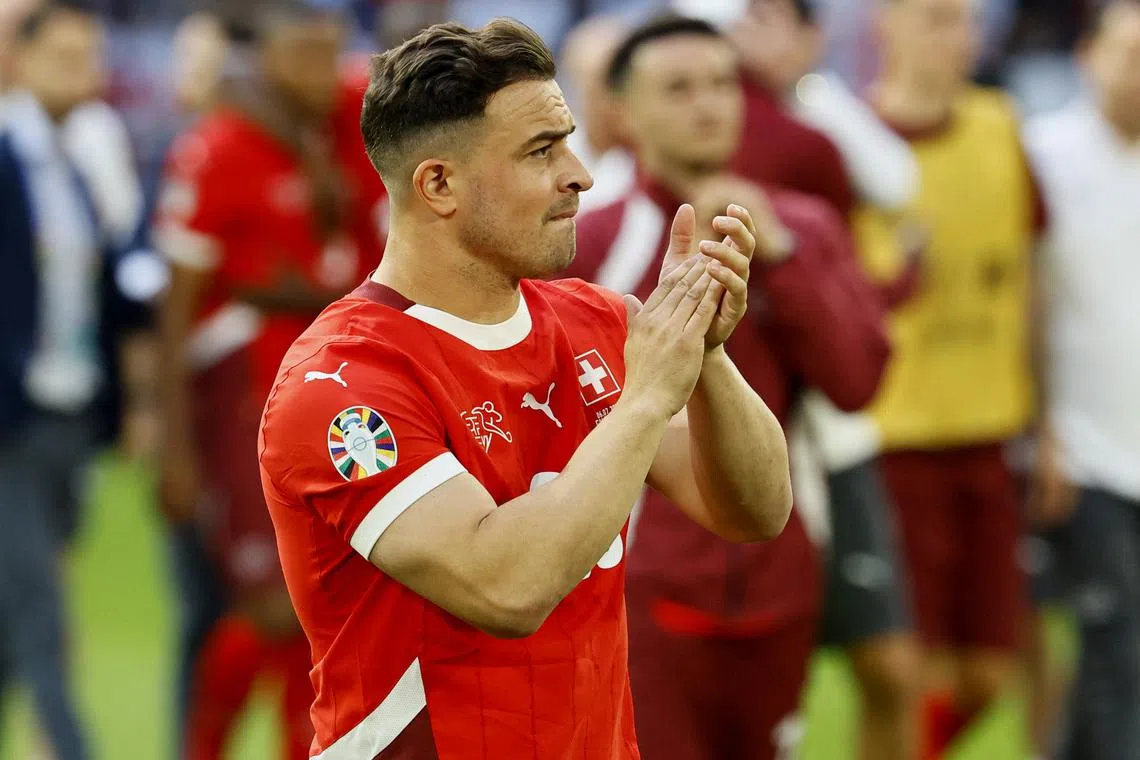 FILE PHOTO: Soccer Football - Euro 2024 - Quarter Final - England v Switzerland - Dusseldorf Arena, Dusseldorf, Germany - July 6, 2024 Switzerland's Xherdan Shaqiri applauds fans after the match REUTERS/Wolfgang Rattay/File Photo