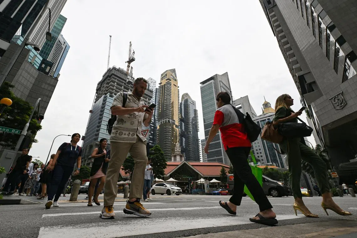 ST20221101-202253546871-Lim Yaohui-pixgeneric/

Generic photograph of people crossing the road at the junction of Robinson Road and Cross Street opposite Lau Pa Sat in the CBD area on Nov 1, 2022.

Can be used for stories on money, population, property, land, commercial, office, invest, budget, income, bank, finance, financial, CBD, URA, population, economy, and development.

(ST PHOTO: LIM YAOHUI)