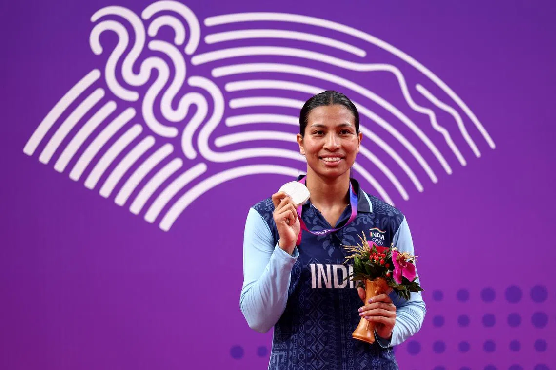 FILE PHOTO: Asian Games - Hangzhou 2022 - Boxing - Hangzhou Gymnasium, Hangzhou, China - October 4, 2023 Silver medallist India's Lovlina Borgohain poses during the medal ceremony for the Women's 66-75kg REUTERS/Eloisa Lopez