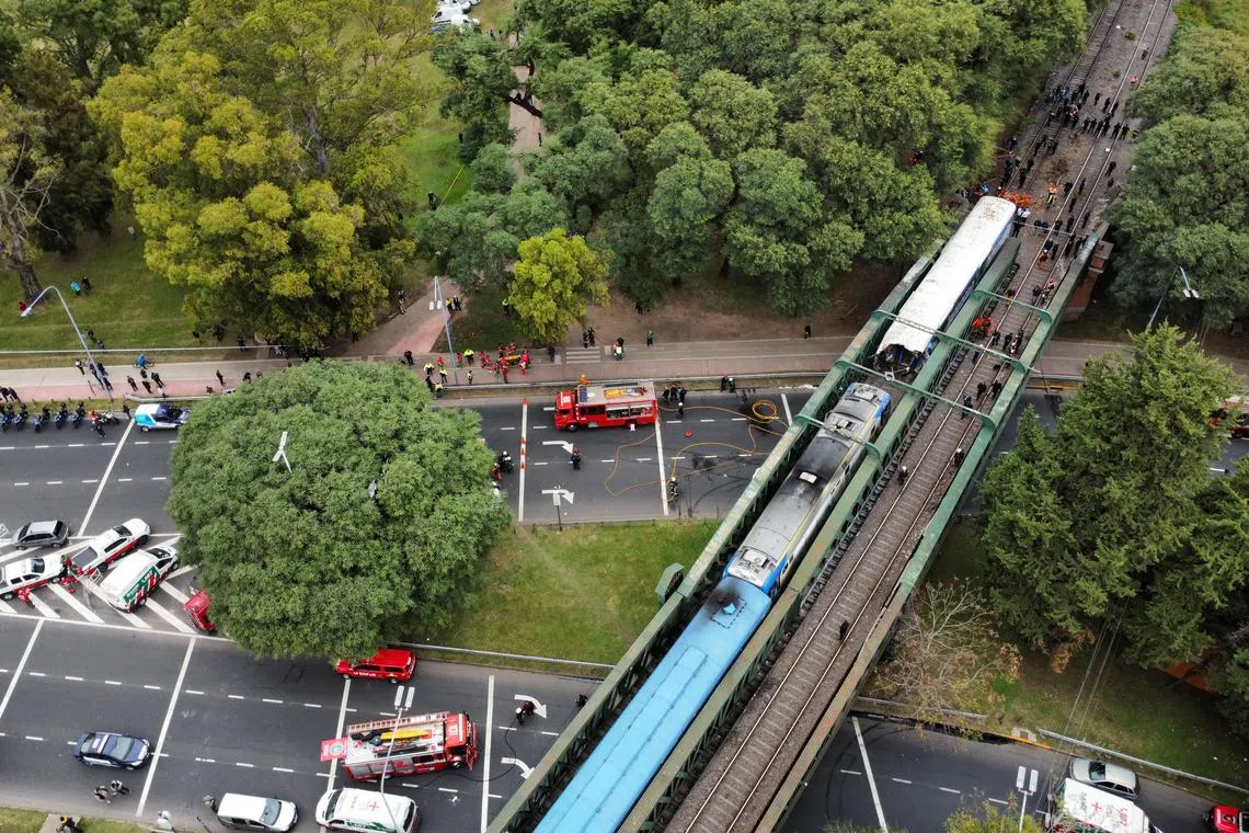 A drone view shows rescue teams working on the site of a train collision in Buenos Aires, Argentina, May 10, 2024. REUTERS/Agustin Marcarian