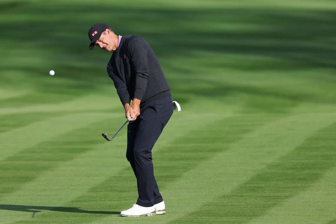 Adam Scott of Australia playing a shot on the 16th hole prior to The Players Championship.