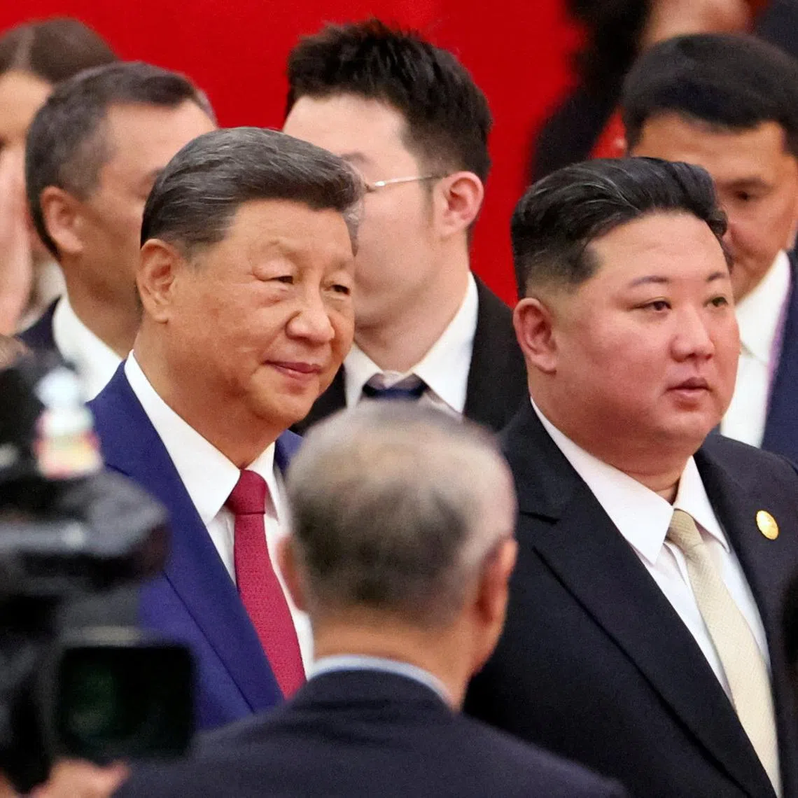 Chinese President Xi Jinping and North Korean leader Kim Jong Un arrive for a reception marking the 80th anniversary of the end of World War Two, at the Great Hall of the People in Beijing, China September 3, 2025. REUTERS/Florence Lo/File Photo