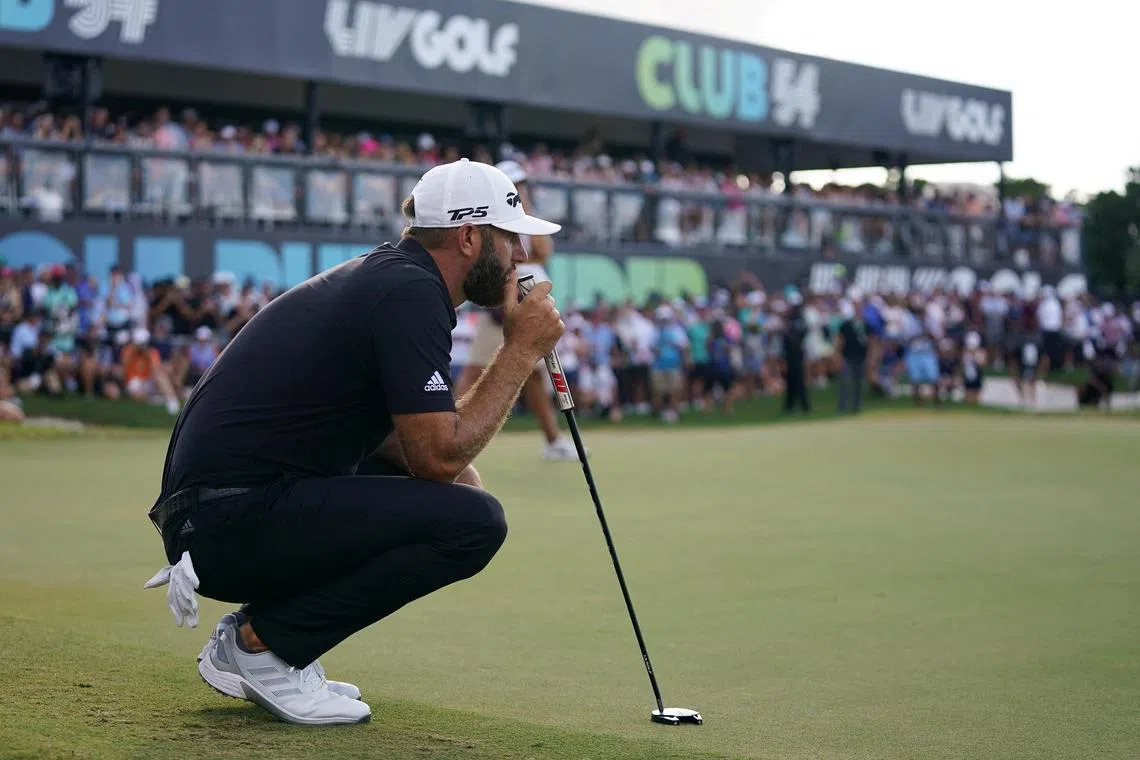 Dustin Johnson looking over the 18th green during the final round of LIV Golf's season finale in October 2022. 