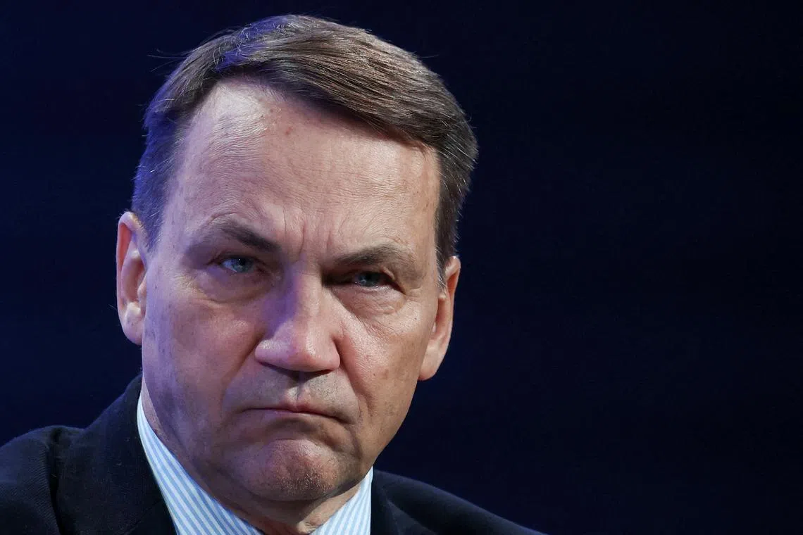 FILE PHOTO: Polish Foreign Minister Radoslaw Sikorski takes part in the panel discussion \"Ukraine: The Road Ahead\" at the 55th annual World Economic Forum (WEF) meeting in Davos, Switzerland, January 23, 2025. REUTERS/Yves Herman/File Photo