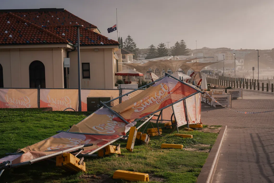 An Australian national flag flying at half-mast at the Bondi Pavilion, the site of the deadly shooting, on Dec 15.