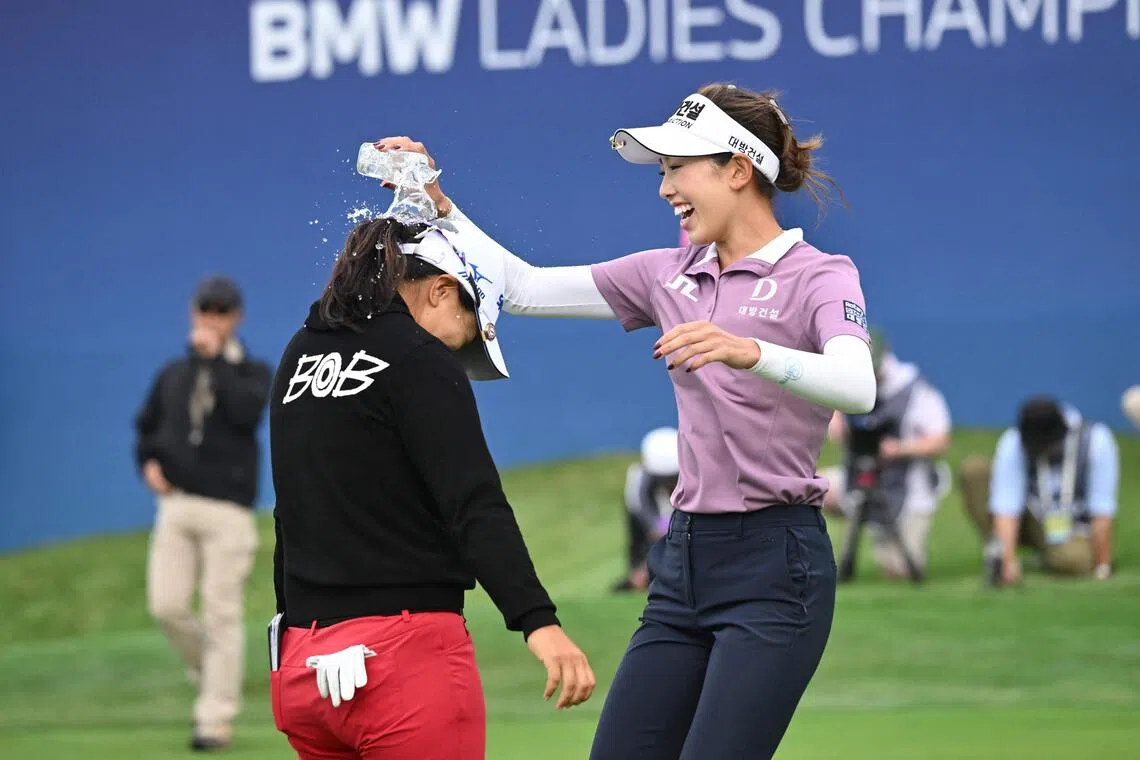 South Korea's Kim Sei-young getting drenched by Yealimi Noh of the United States after winning the BMW Ladies Championship in Haenam, South Korea, on Oct 19.