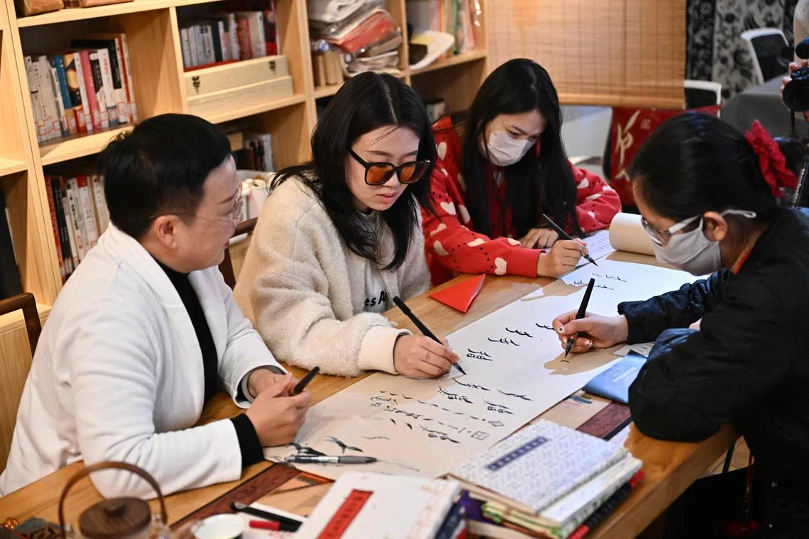 Barred from attending school in the past, women secretly learned Chinese characters and adapted them into Nushu.
