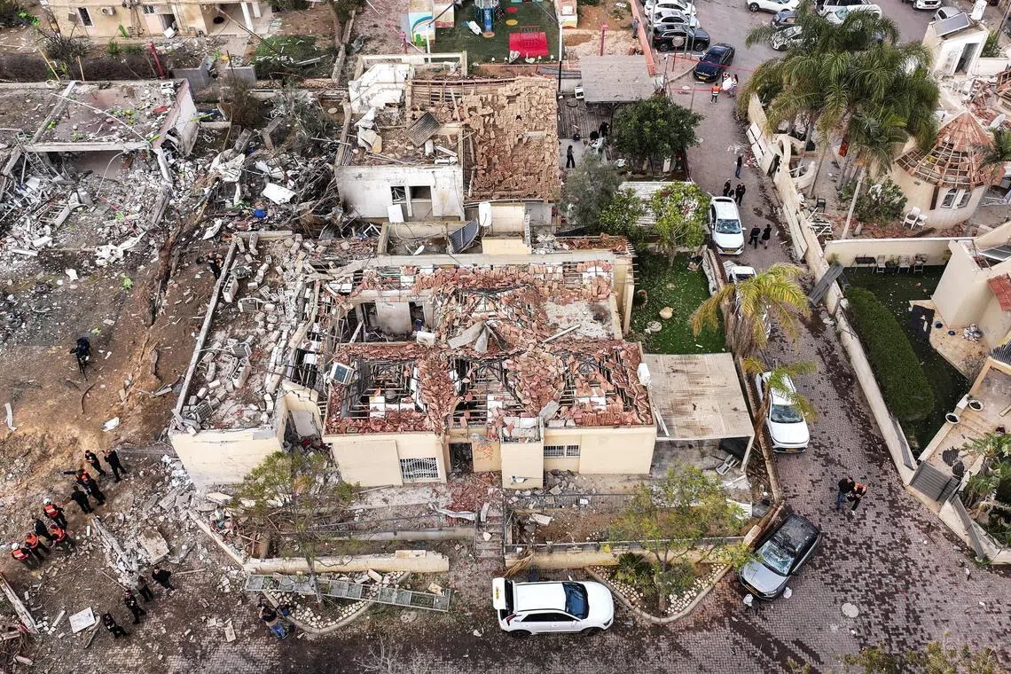 A drone view shows a damage in a residential neighbourhood in Dimona, southern Israel on March 22, 2026.